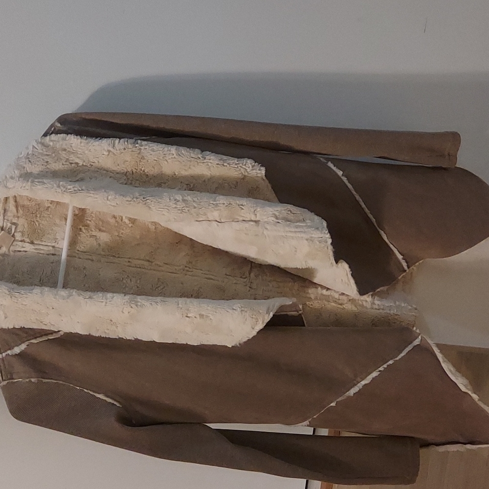 A very nice soft and comfortable jacket that will look beautiful  with anything!